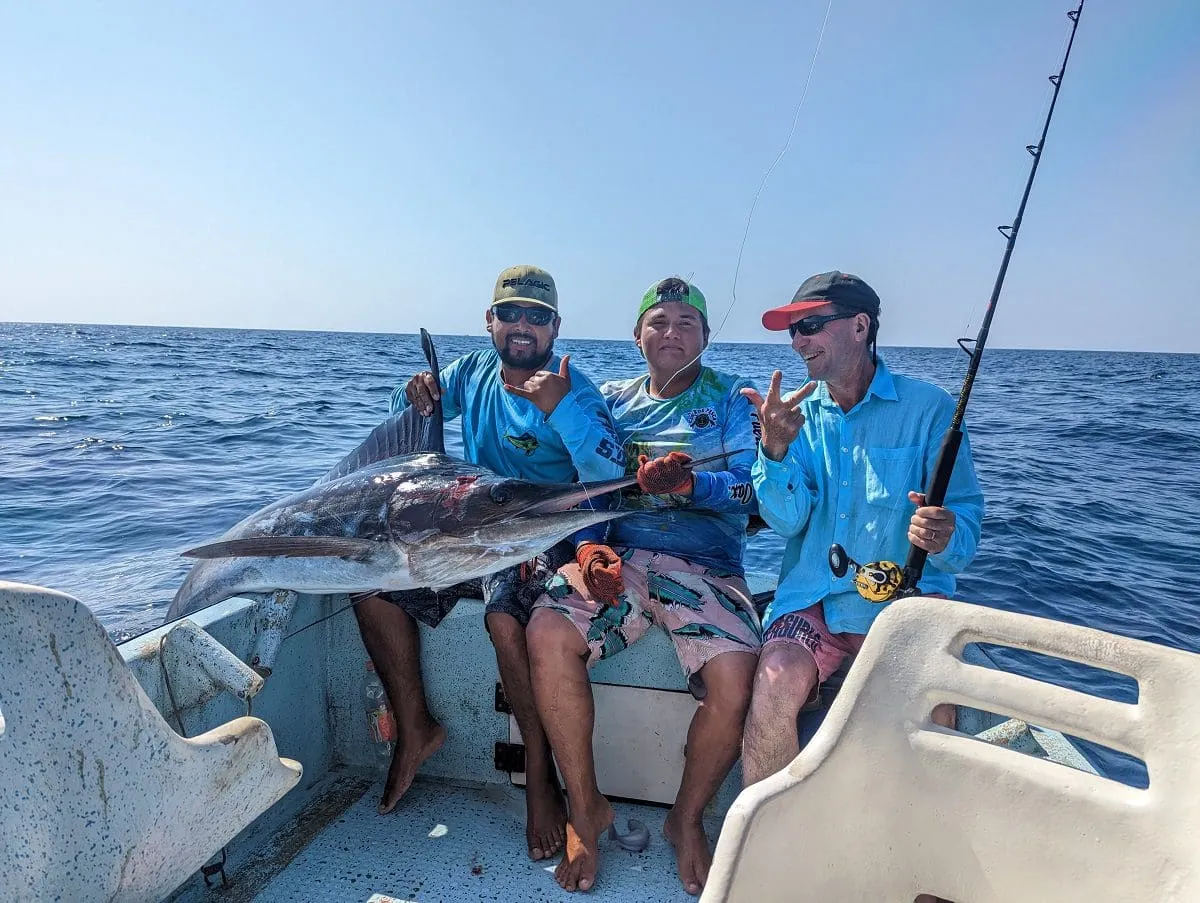 Sport fishing adventure with fresh catch on boat in Puerto Escondido